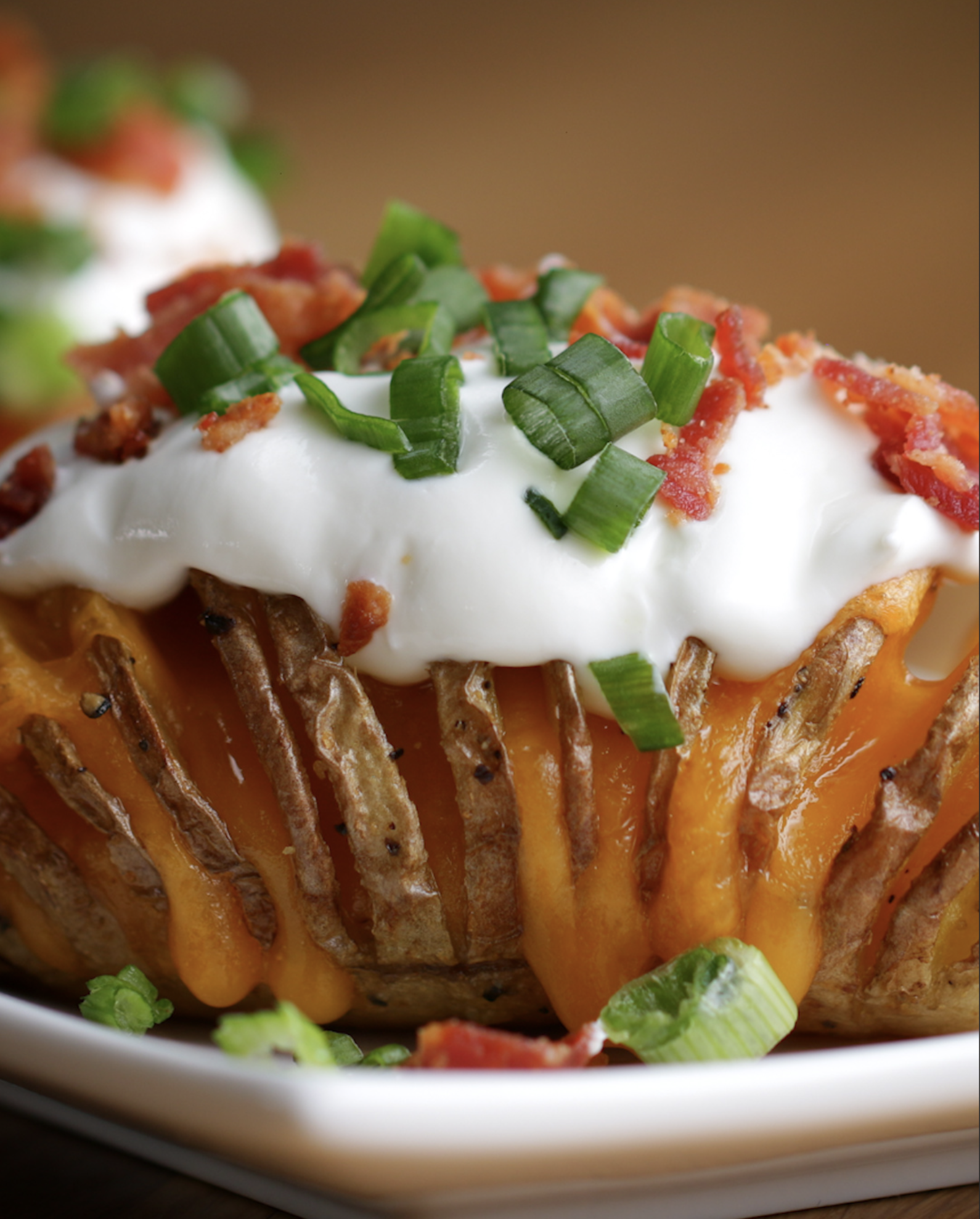 Love At First Sight Loaded Hasselback Potatoes - The Pioneer Plate