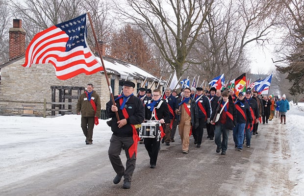 The Nauvoo Legion leads the walk down Main and Parley Streets in Nauvoo to commemorate the 1846 Nauvoo Exodus. Photo courtesy of Bruce Cornwell.